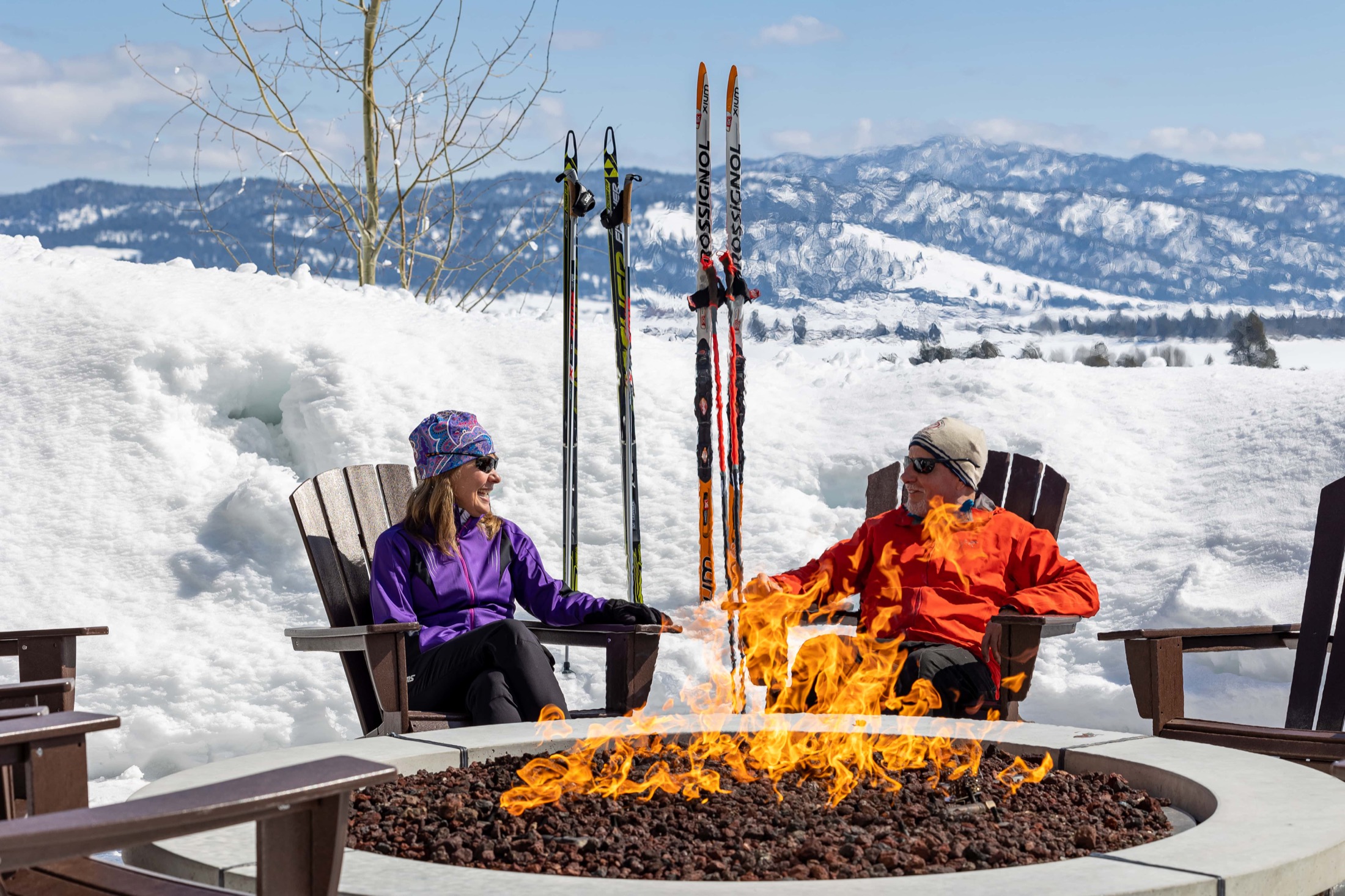 Couple at a bonfire in the winter